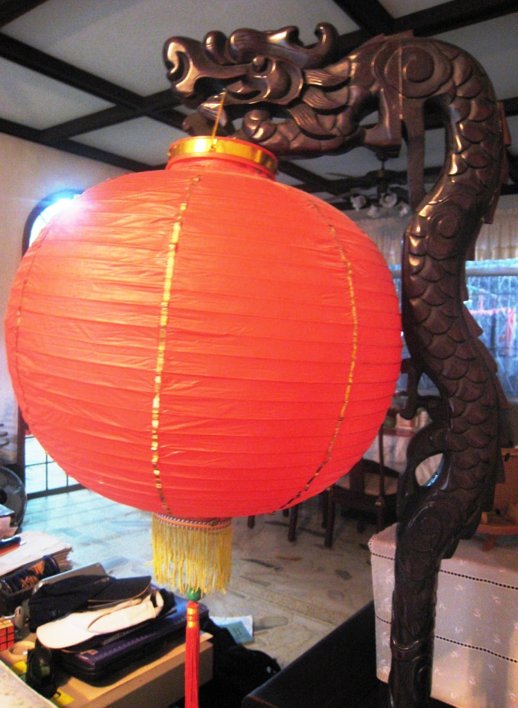 Our antique dragon lantern stand and a RED lantern always spruce up the living room
