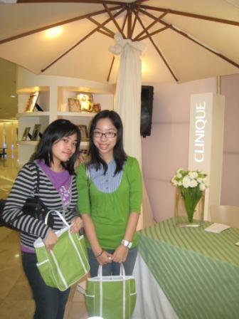 My girls with their Clinique bags
